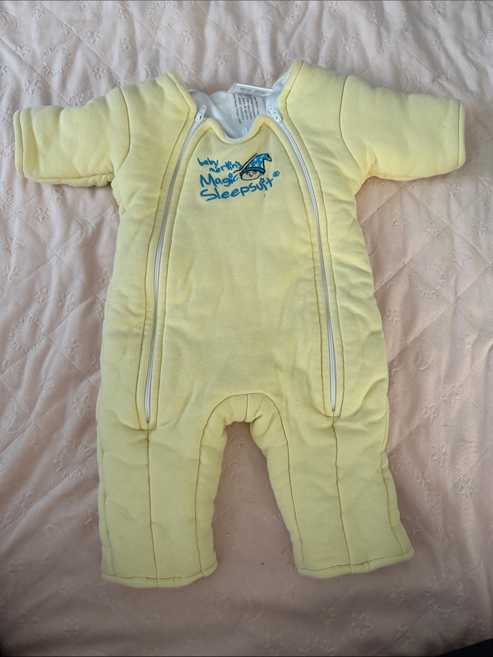 Baby Merlin’s magic sleep sack in Pale Yellow